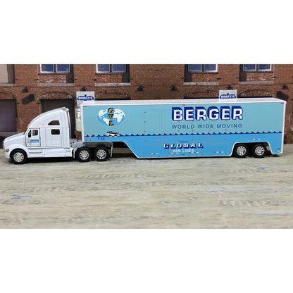 Model truck with 'Berger World Wide Moving' branding in front of a brick building.