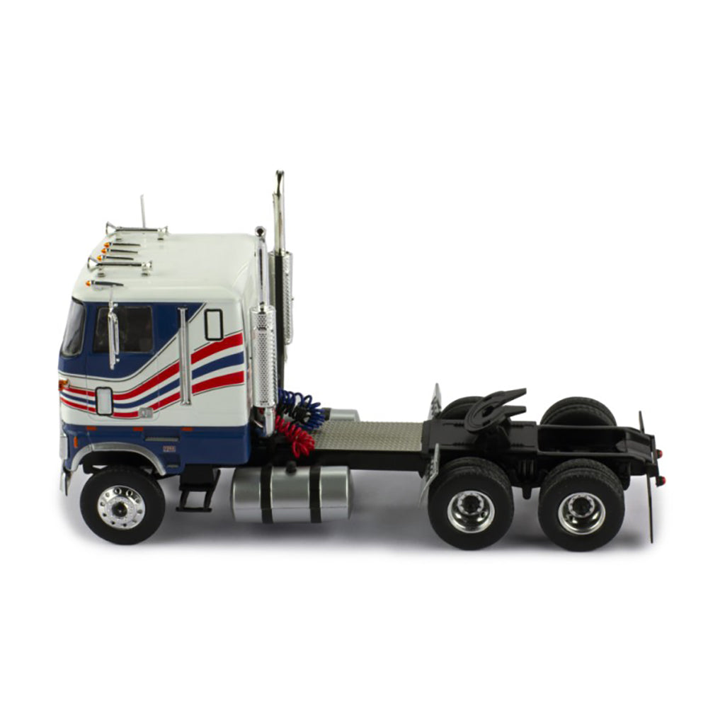 Model Ford CL 9000 truck with a blue and white color scheme on a white background