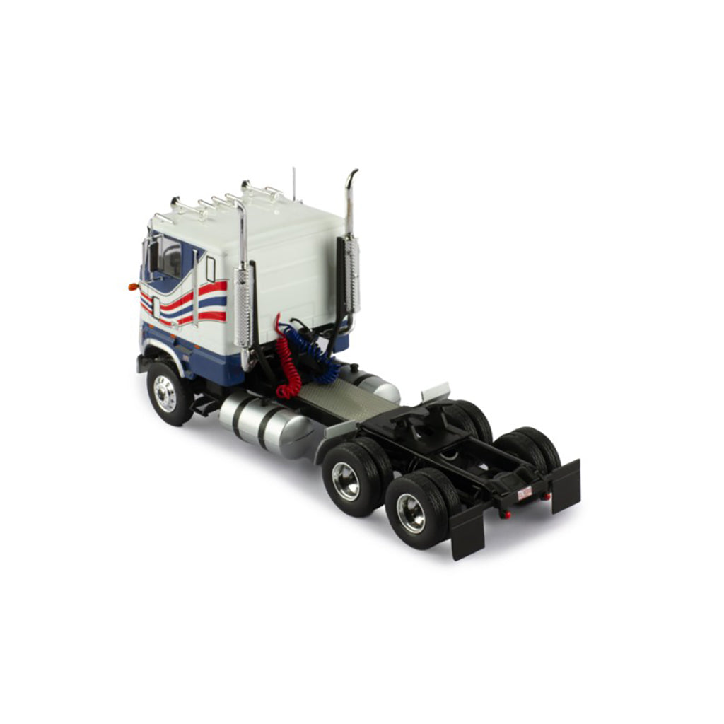 Model Ford CL 9000 truck with a blue and white color scheme on a white background