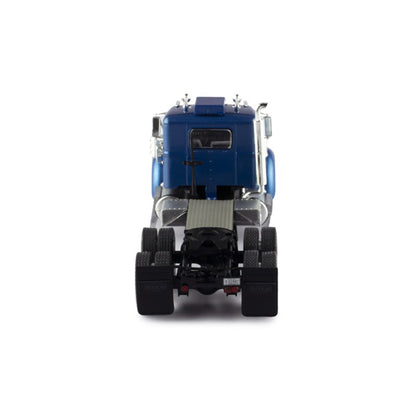 Model of a blue and silver Autocar truck on a white background