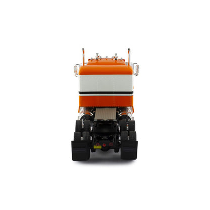 Model of a kenworth w900a orange and white truck on a white background
