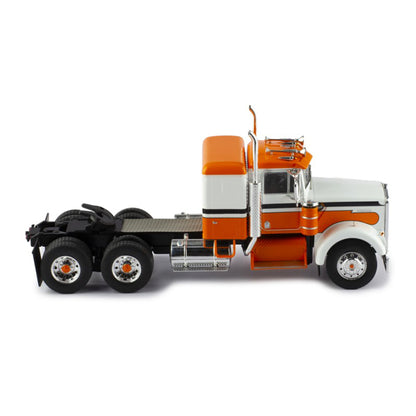 Model of a kenworth w900a orange and white truck on a white background