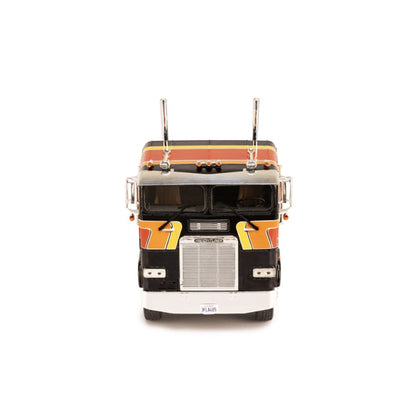 Model of a Freightliner FLA semi-truck on a white background