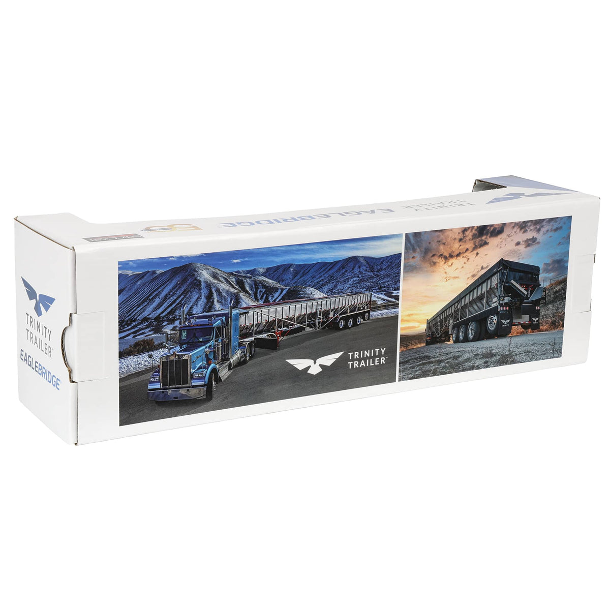 A long white cardboard box for a Trinity Trailer Eagle Bumper, featuring printed photos of semi-trailers and mountains on the front and side panels.