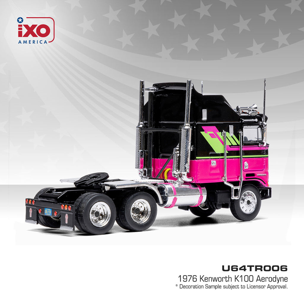 Model of a 1976 Kenworth K100 Aerodyne truck with pink and black design on a gray background.