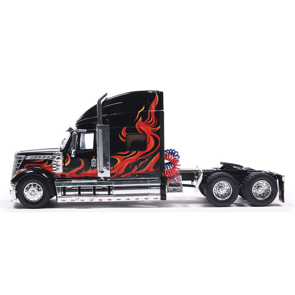 Model truck with flame design on a white background